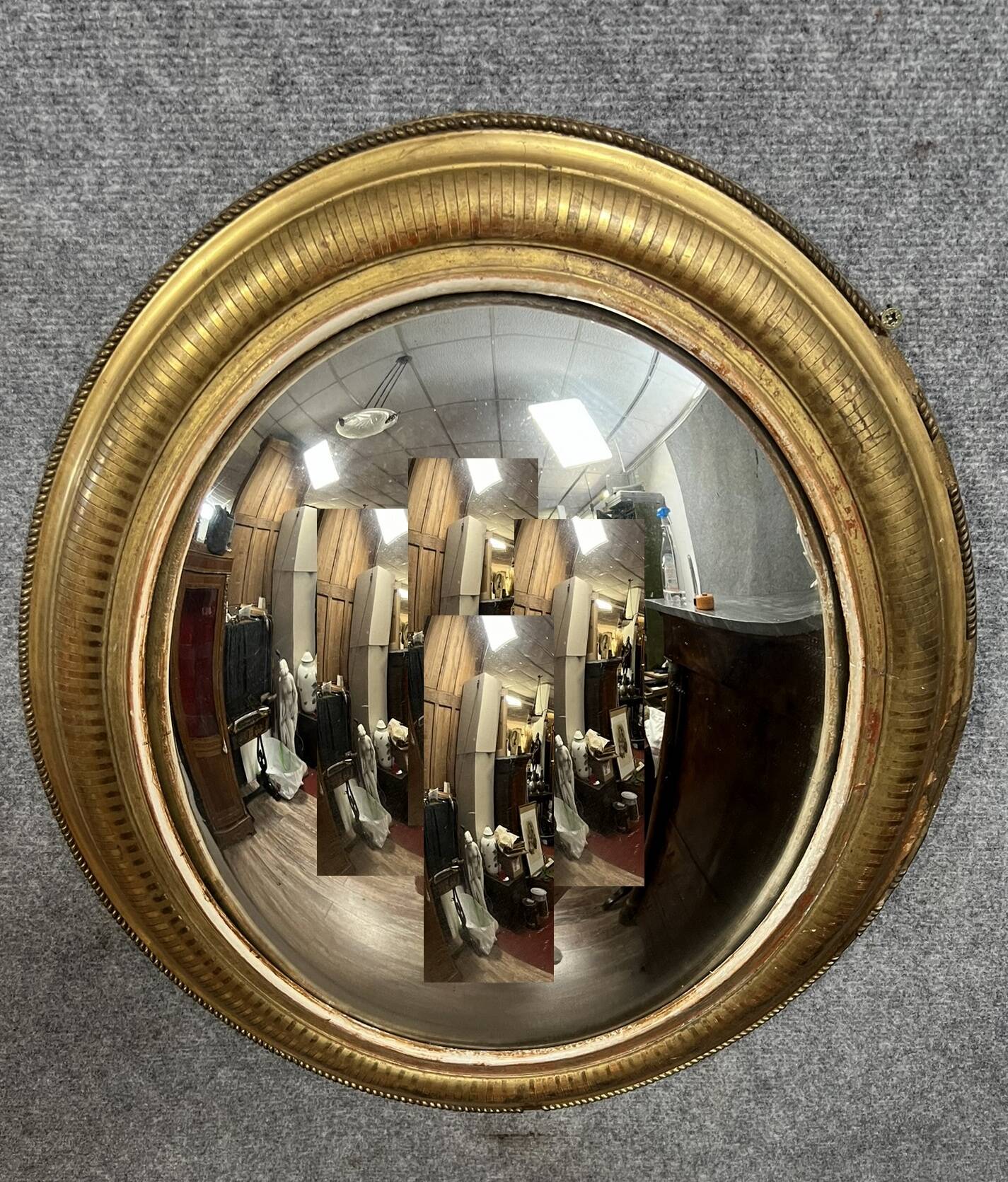 Oval mirror called “witch’s eye” in gilded wood in Louis XVI style circa 1850