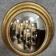 Oval mirror called “witch’s eye” in gilded wood in Louis XVI style circa 1850