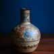Hand-painted terracotta jug