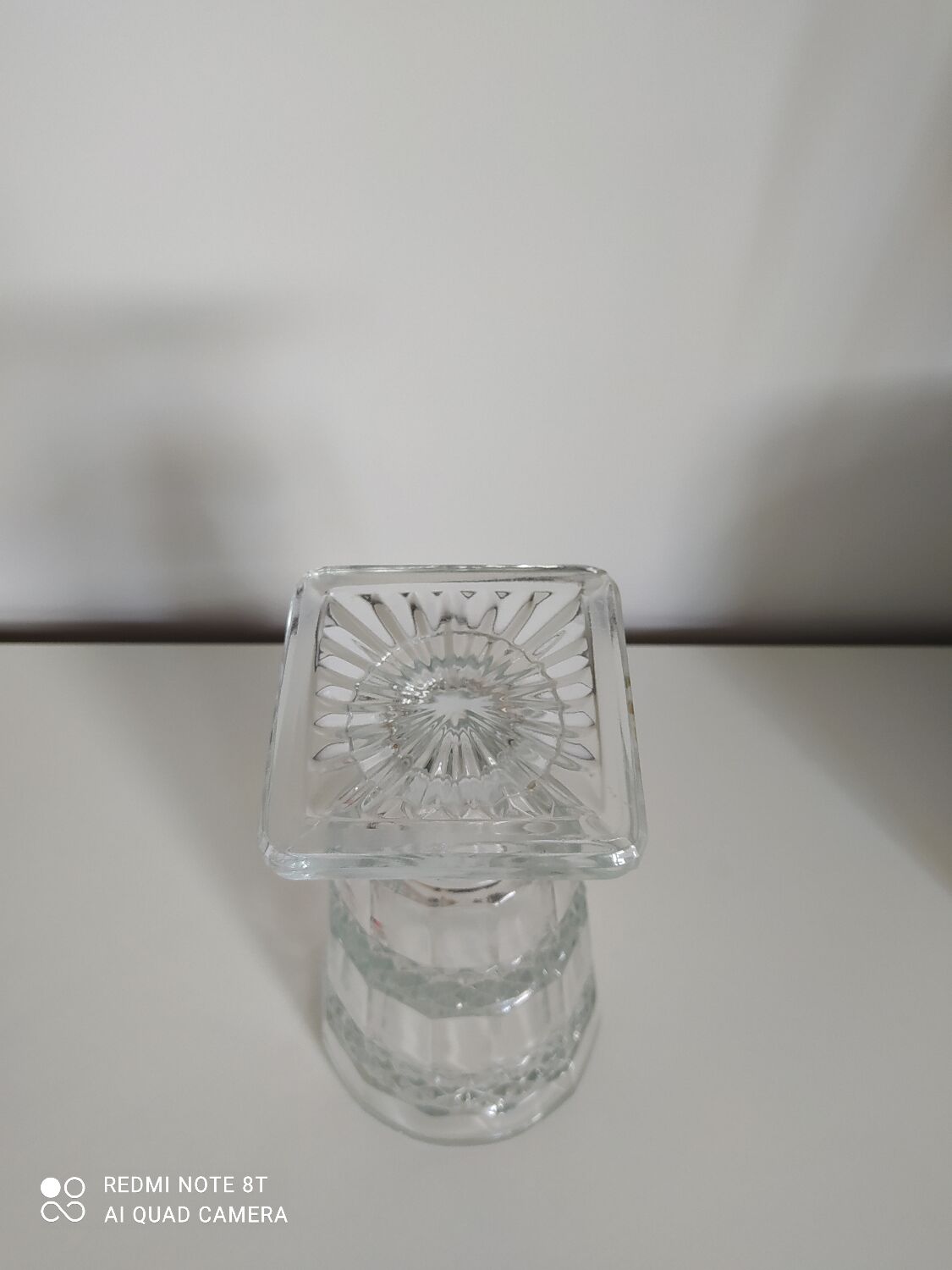 Large carved glass vase on foot