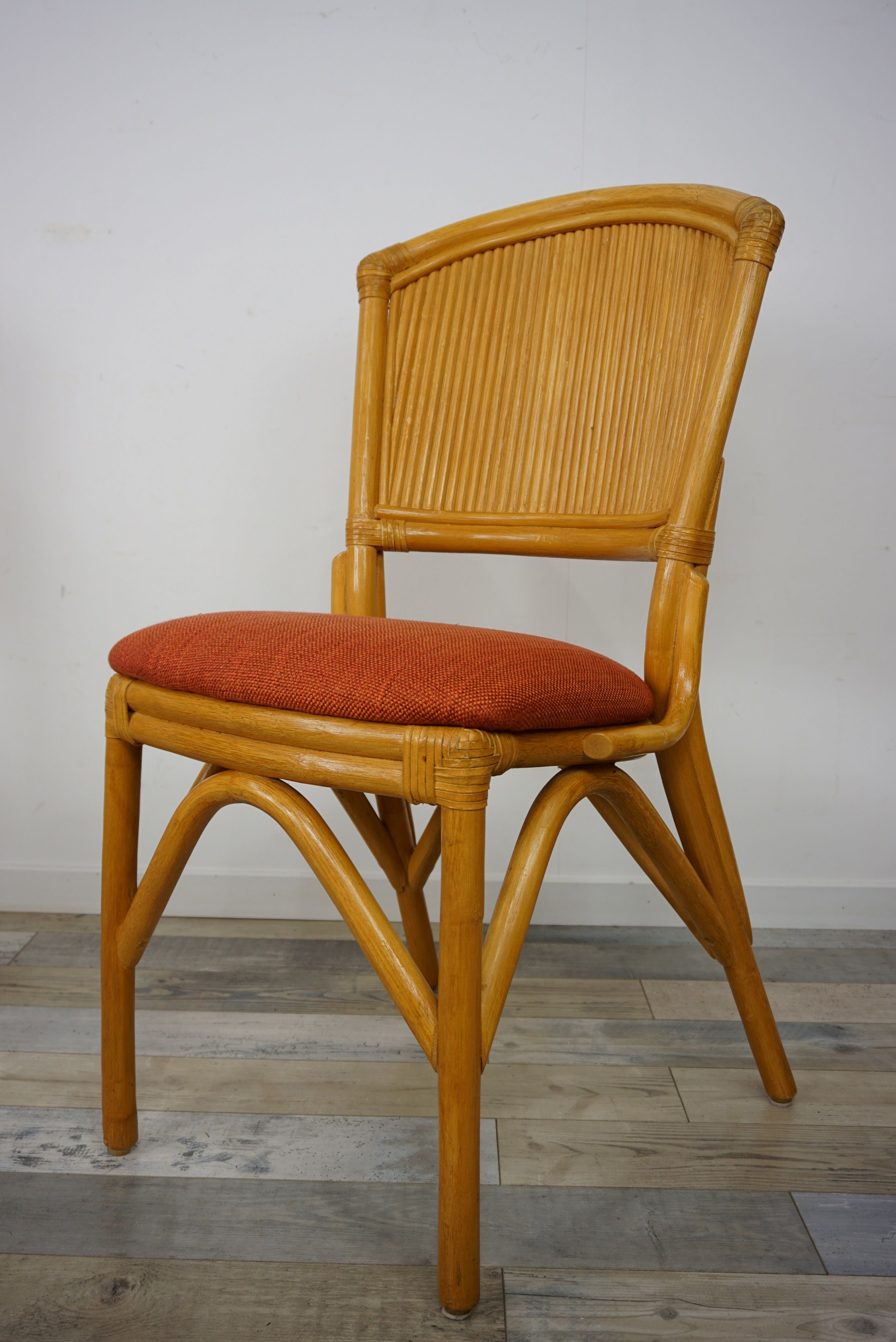 Suite of 4 chairs in Italian rattan design from the 60/70