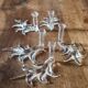 5 crystal knife rests with vases