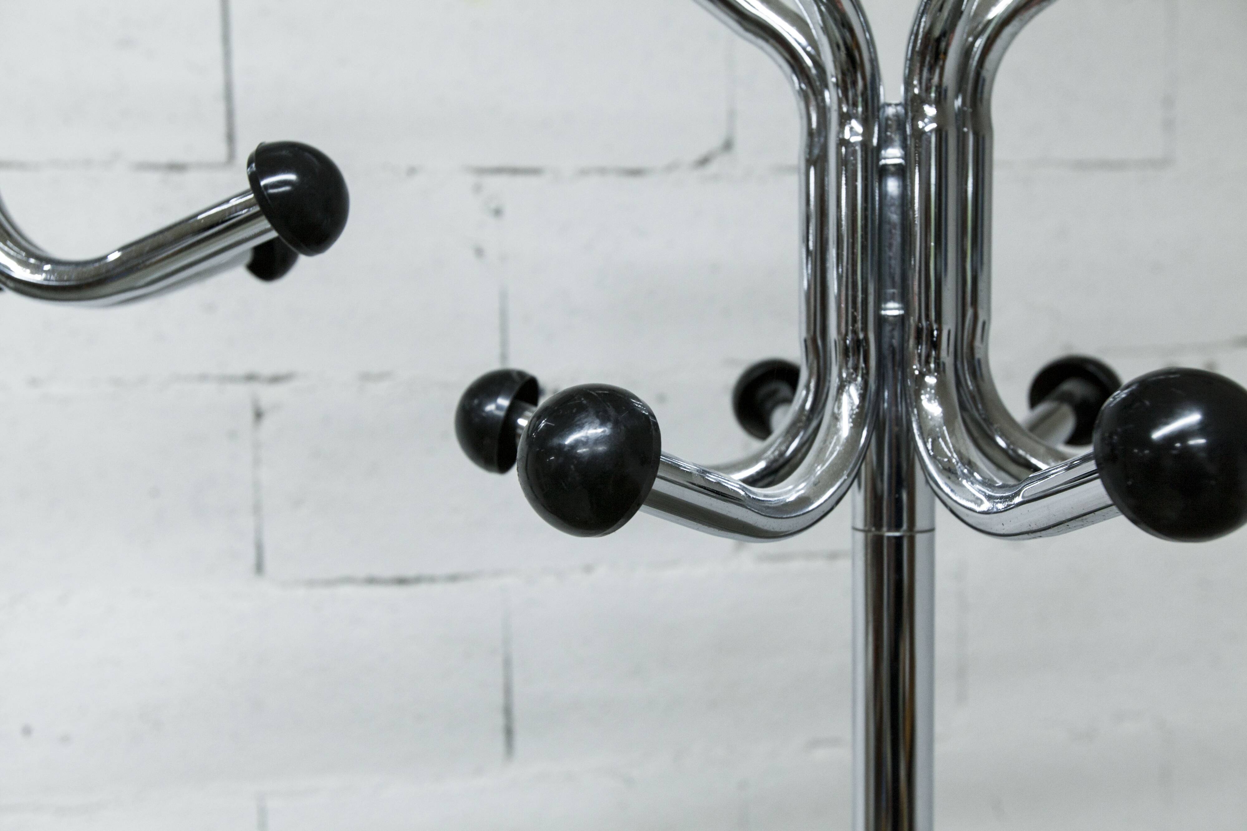 Coat rack with 12 chrome and black plastic hooks, 1960, 2m.