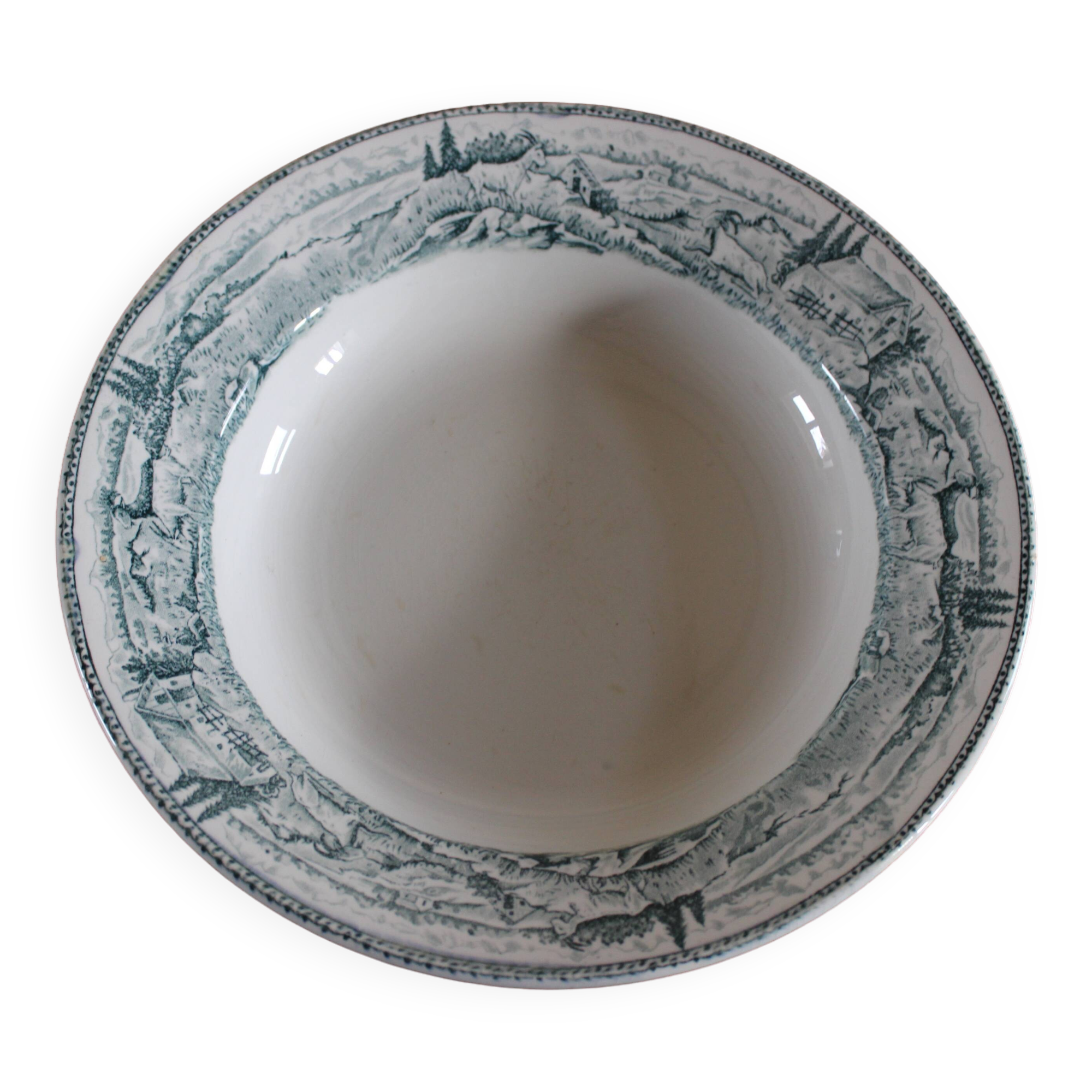 Round hollow dish, Iron earth, Saint Amand, milkmaid model, goat decoration