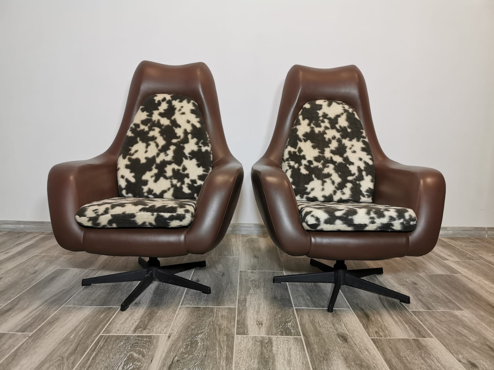 Mid century swivel armchairs