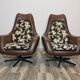 Mid century swivel armchairs