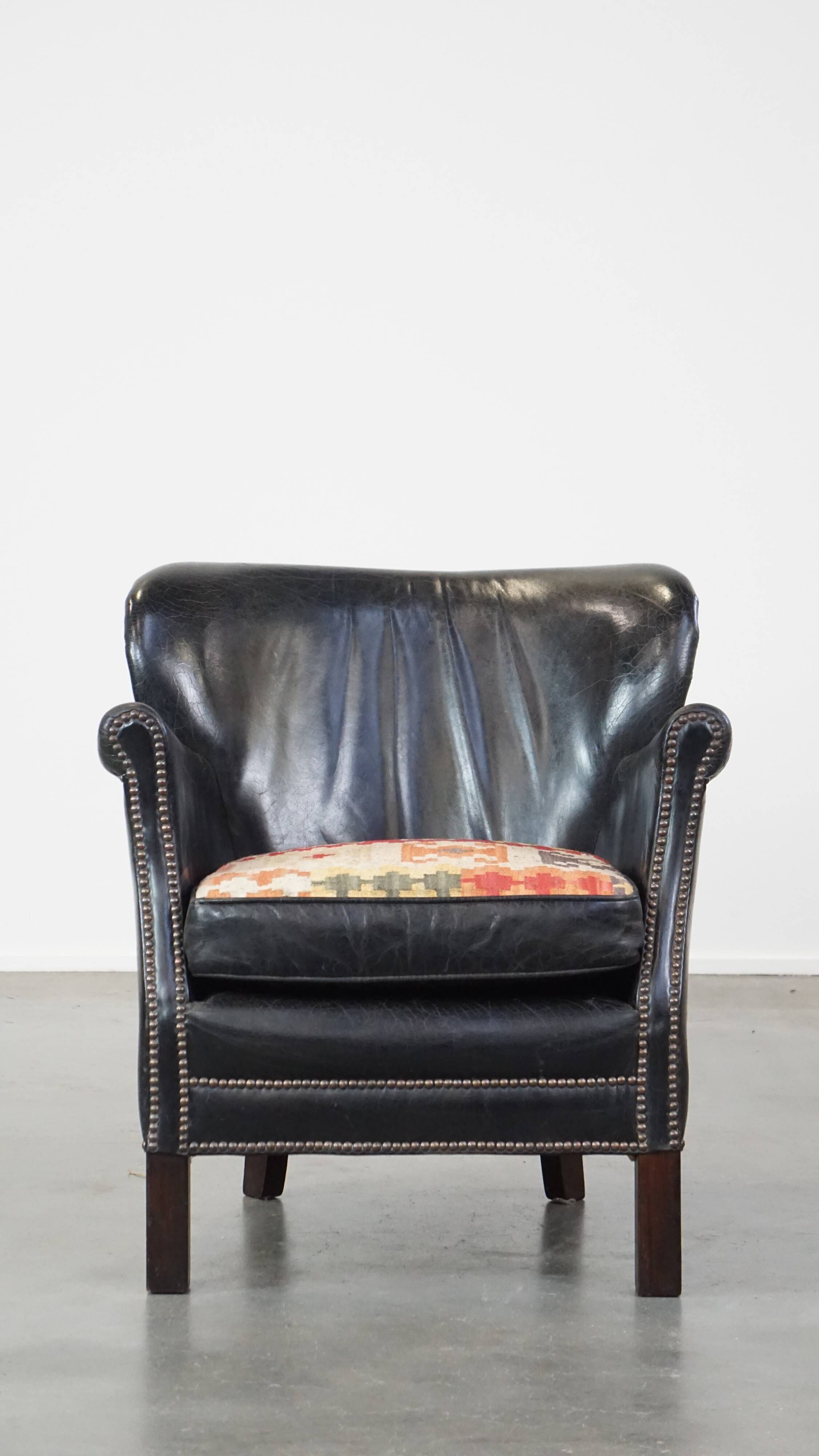 Fauteuil en cuir de vachette noir
