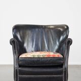Fauteuil en cuir de vachette noir
