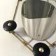 Black and gold metal coat rack., 1950