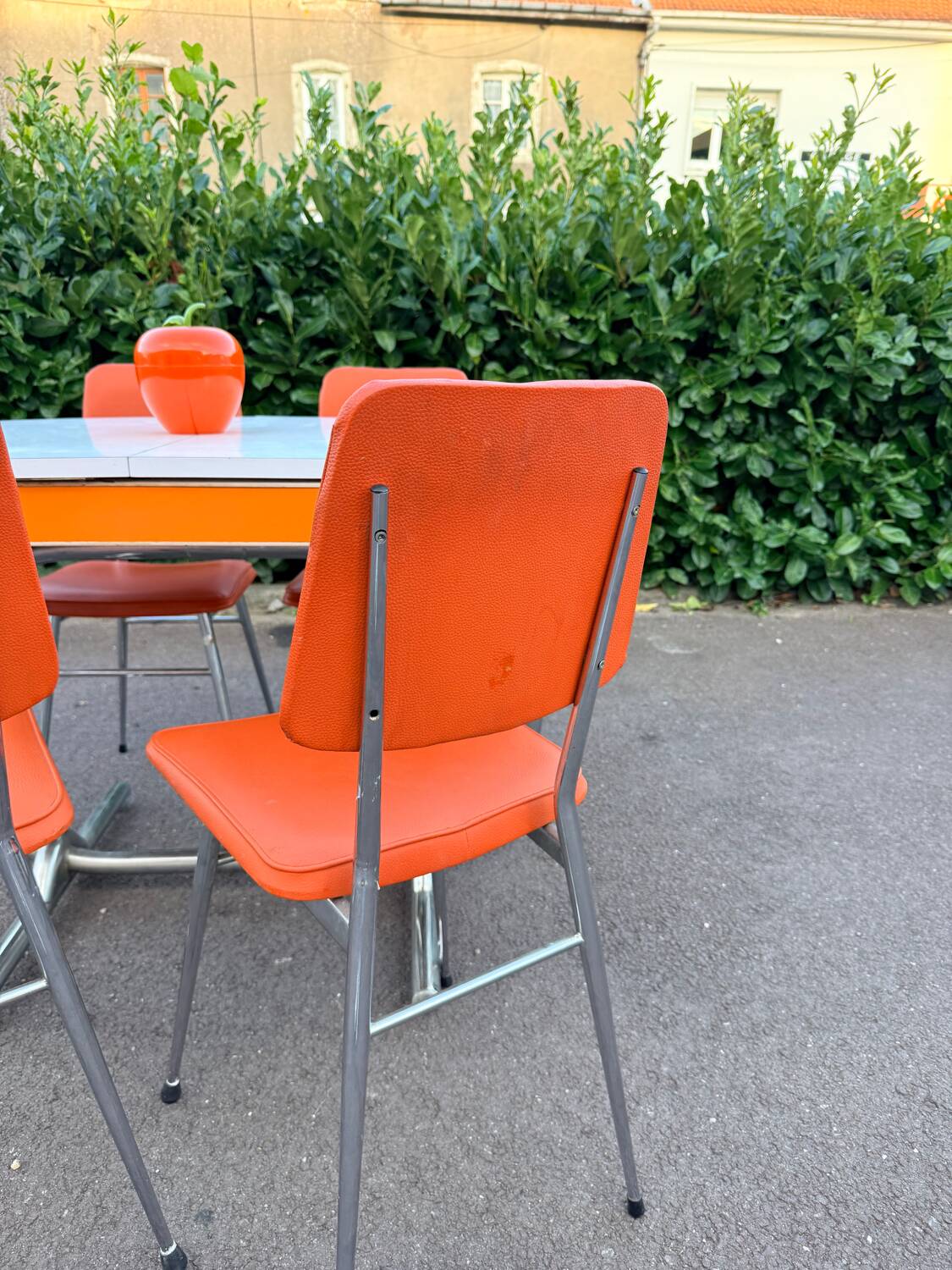 Formica leatherette chair with orange table, vintage 70s Space Age