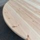 Scandinavian round dining table with a central base, stripped, made of solid raw wood, 90.