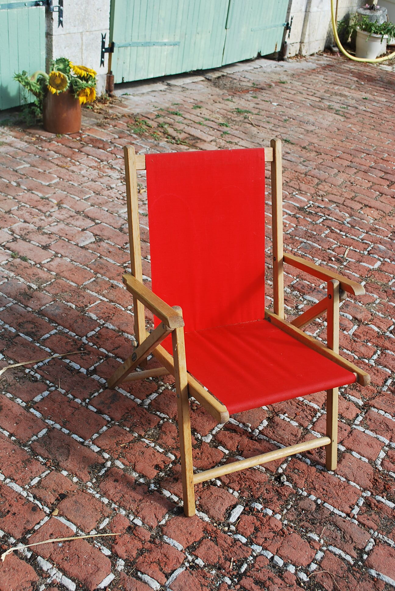 Chaise camping vintage rouge