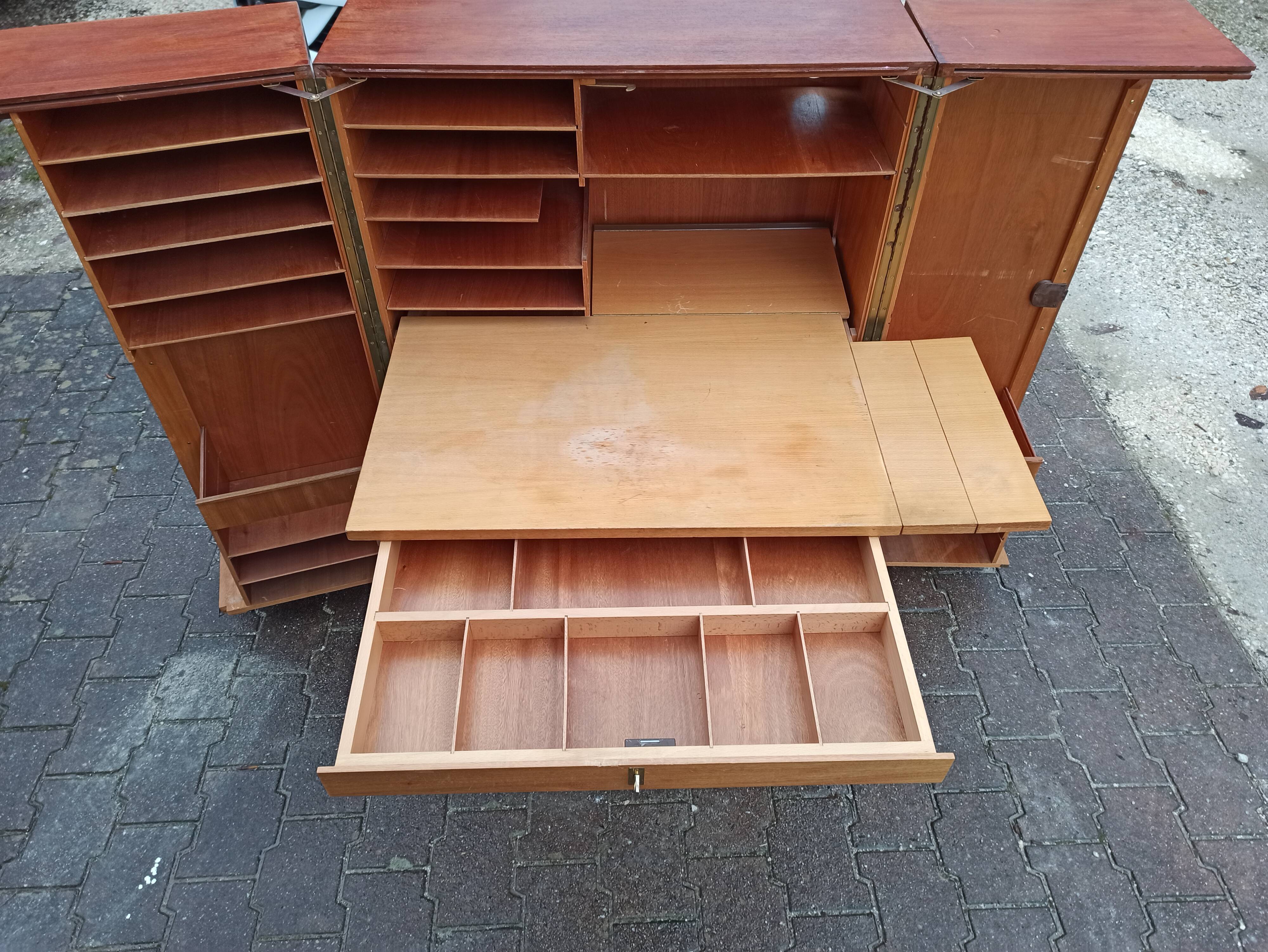 Folding desk says "Magic box" by designers Mummenthaler - Meier, Switzerland