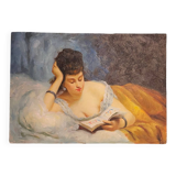Young woman lying reading oil on panel