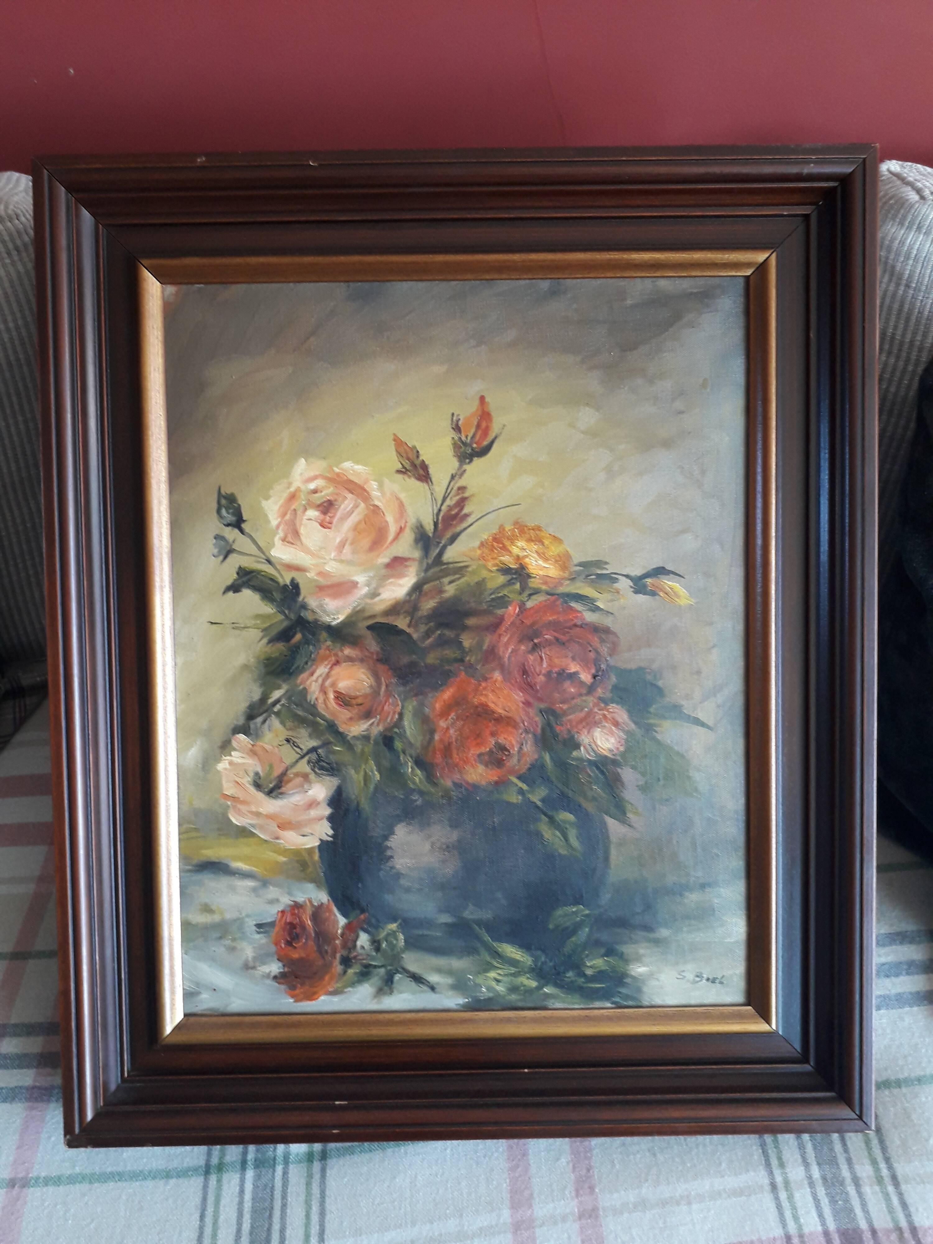 Antique oil painting depicting a bouquet of roses