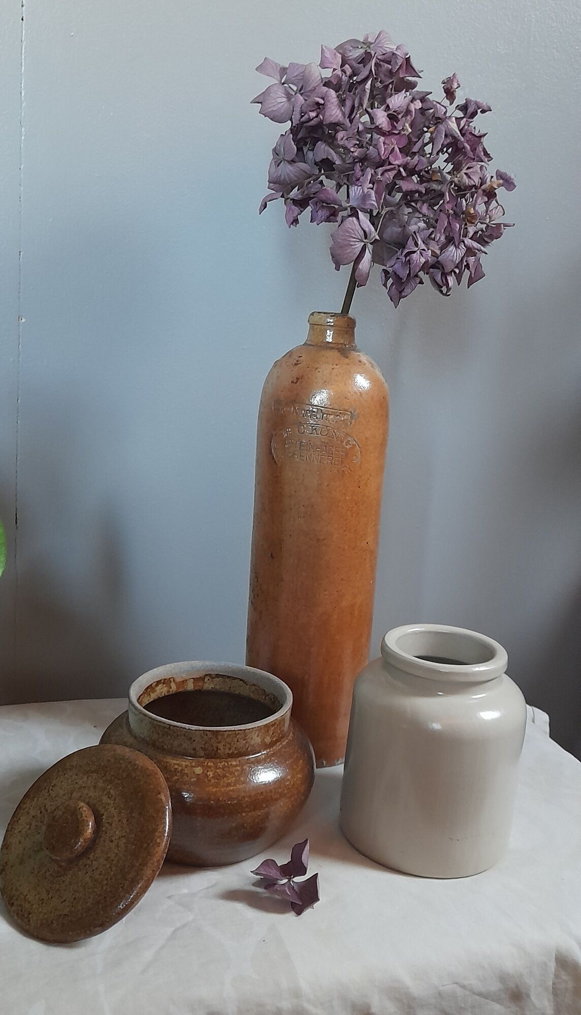 Old salt pot in sandstone, with lid