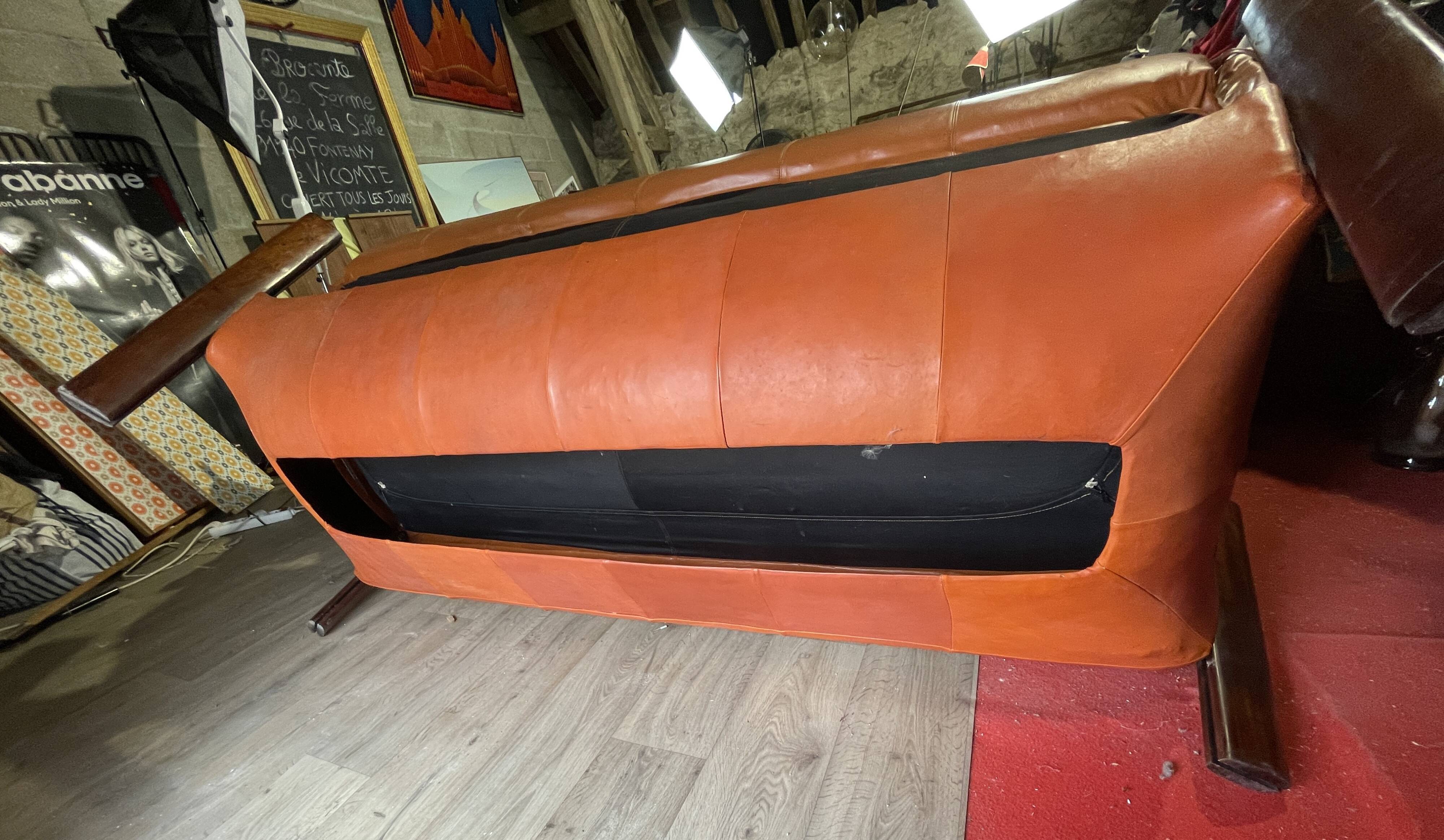 Percival lafer mp-211 sofa set with two armchairs and an ottoman in leather.