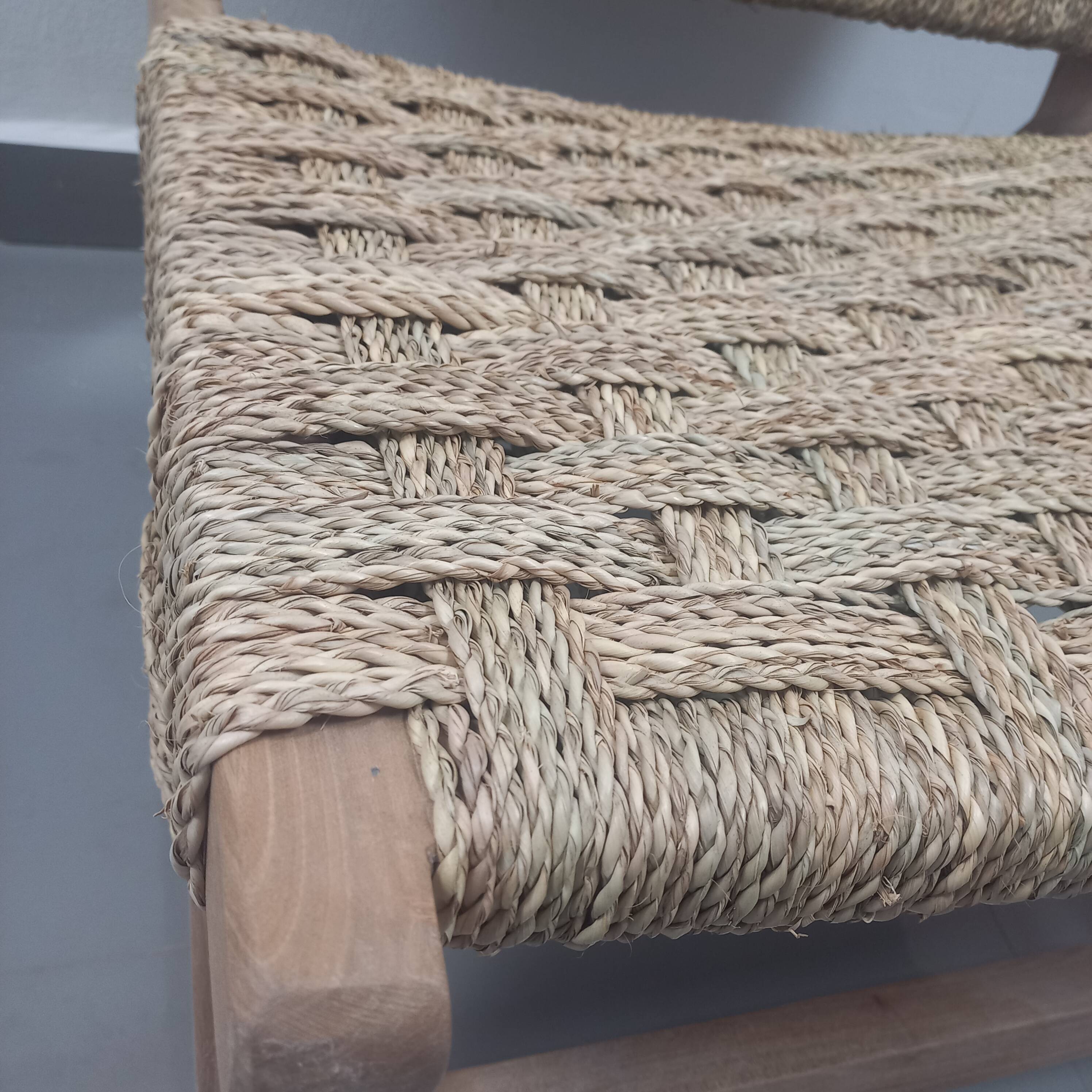 Chair woven from palm leaves