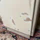 Small one-door Art Deco cabinet with a patina.