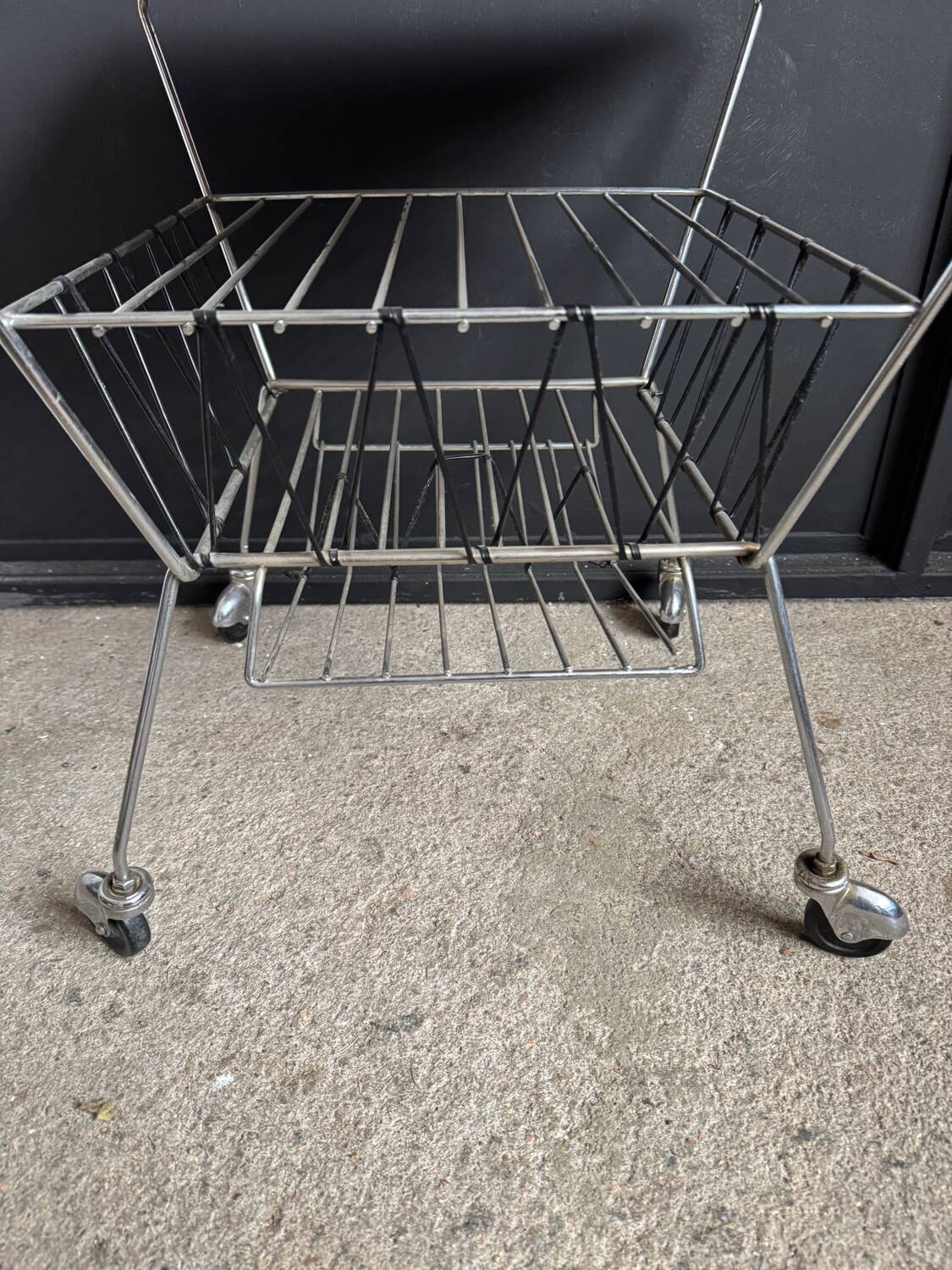 1950s rolling magazine rack