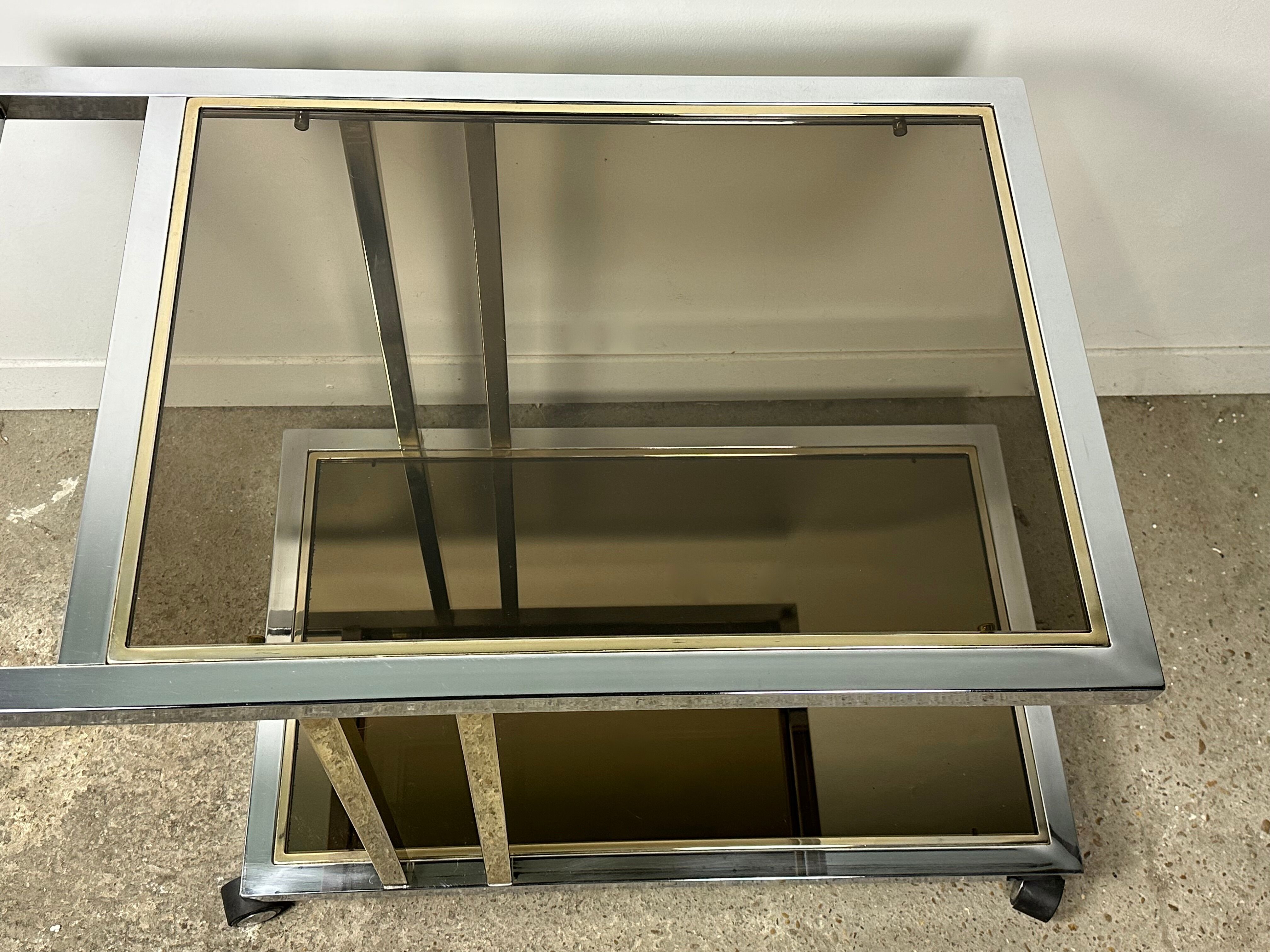 Belgo chrome serving cart/rolling table in chromed and gold-plated brass, 70s