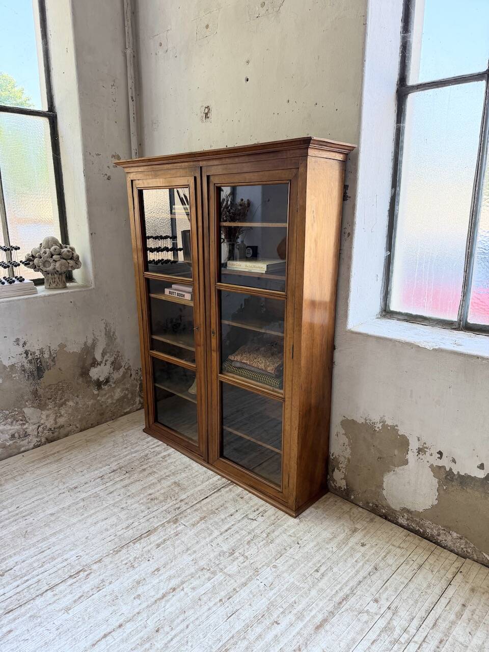 Glass-fronted walnut library 1900