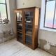Glass-fronted walnut library 1900