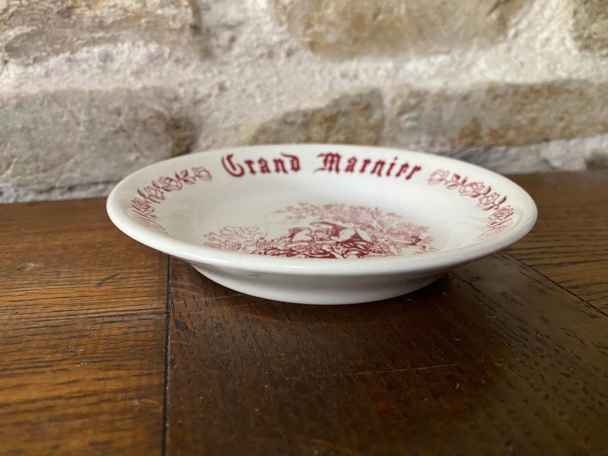 Grand Marnier Liqueur ashtray with marquis and marquise decoration