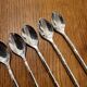 6 long silver-plated metal spoons