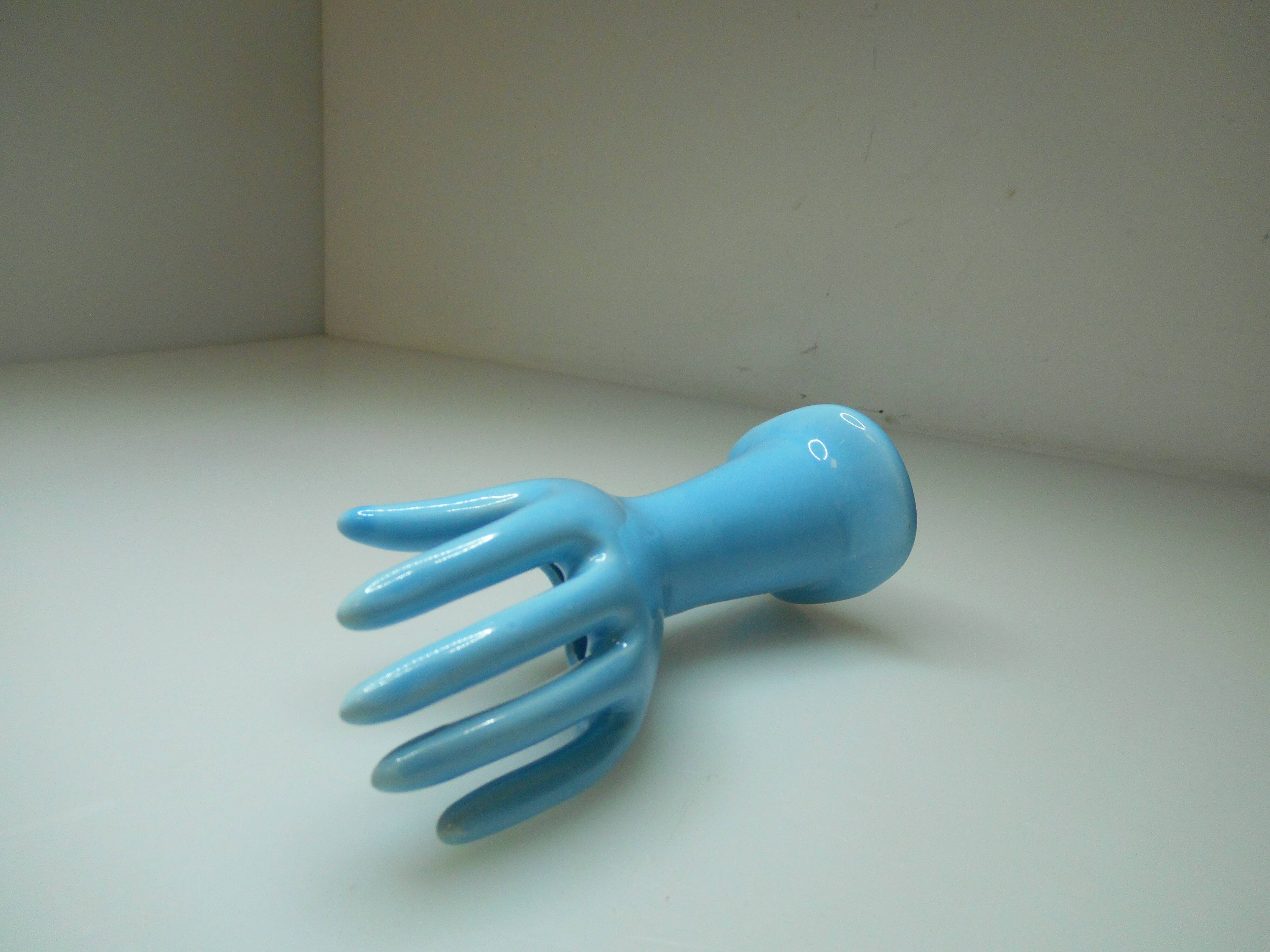 Vintage light blue ceramic hand