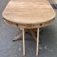 Round extendable dining table Regency central leg stripped mahogany 1960