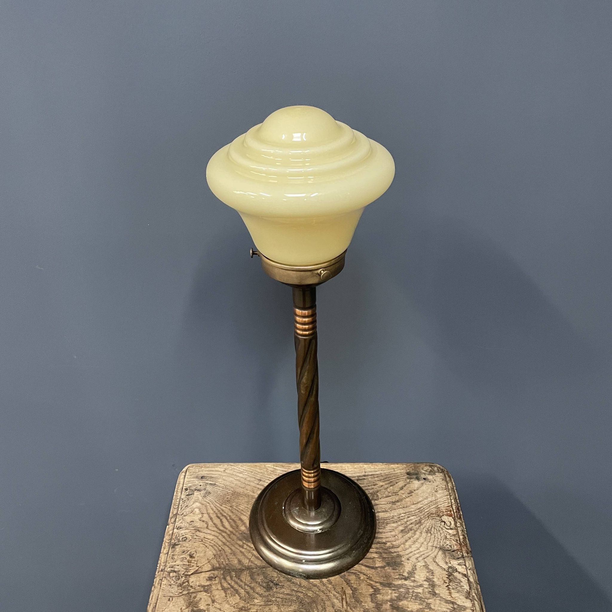 Standing copper table lamp with glass shade