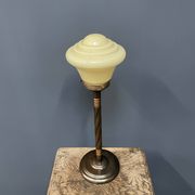Standing copper table lamp with glass shade