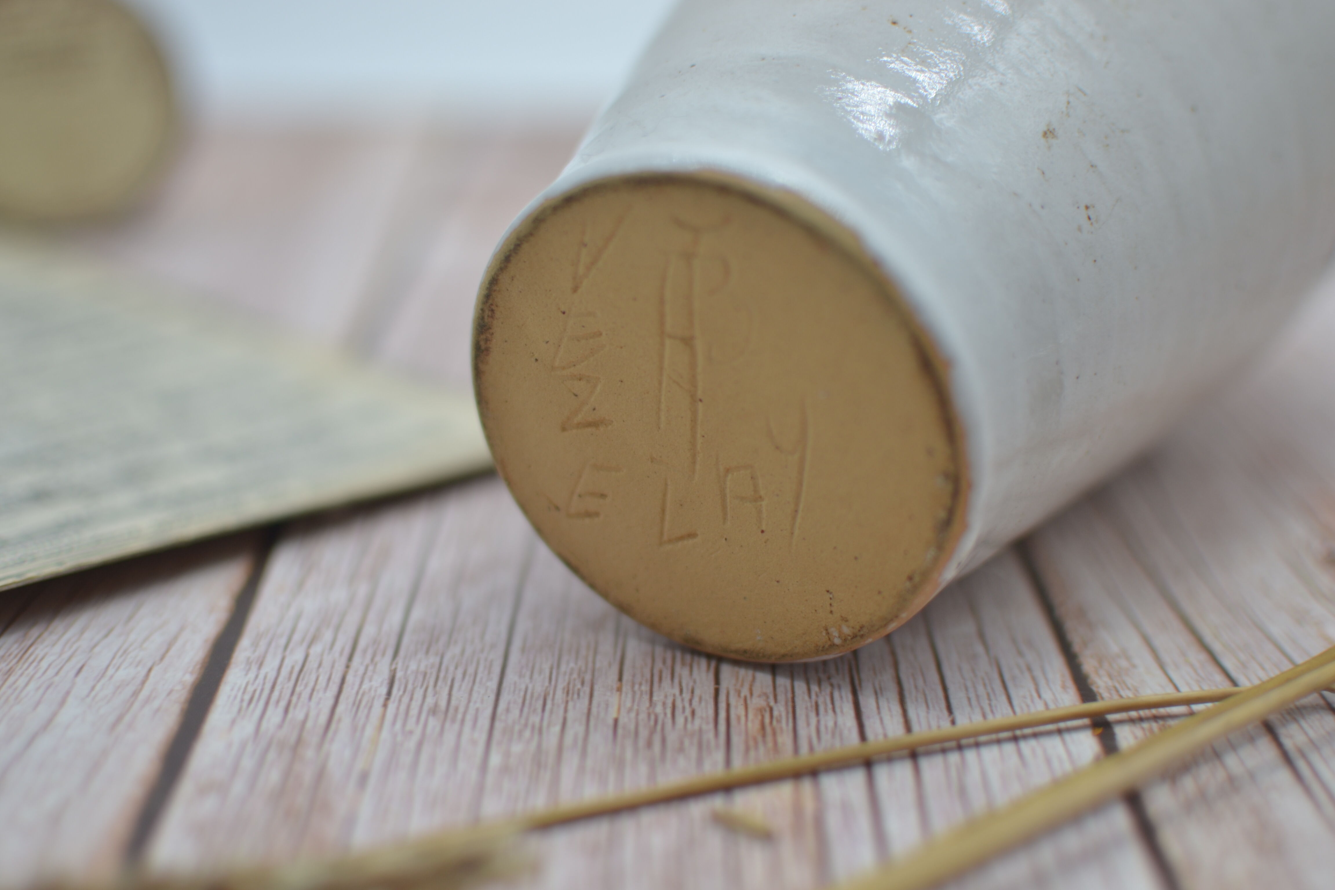 Vintage plum stoneware bottle