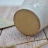 Vintage plum stoneware bottle