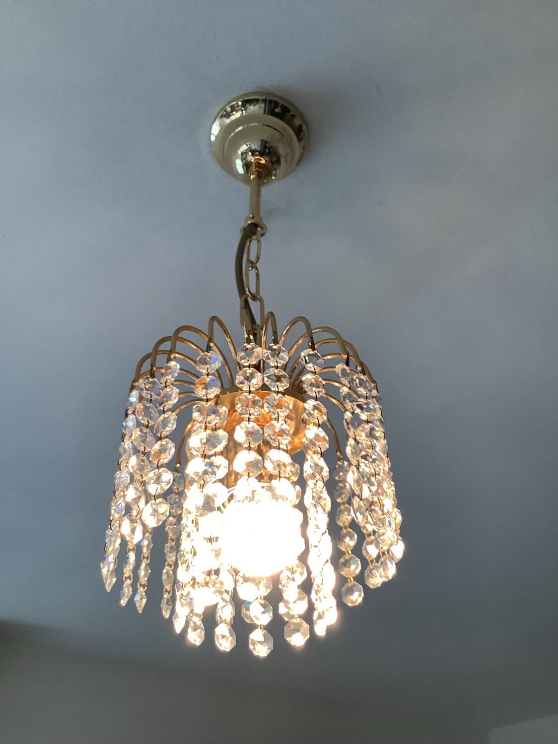 Small vintage brass chandelier with crystal droplets