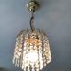 Small vintage brass chandelier with crystal droplets