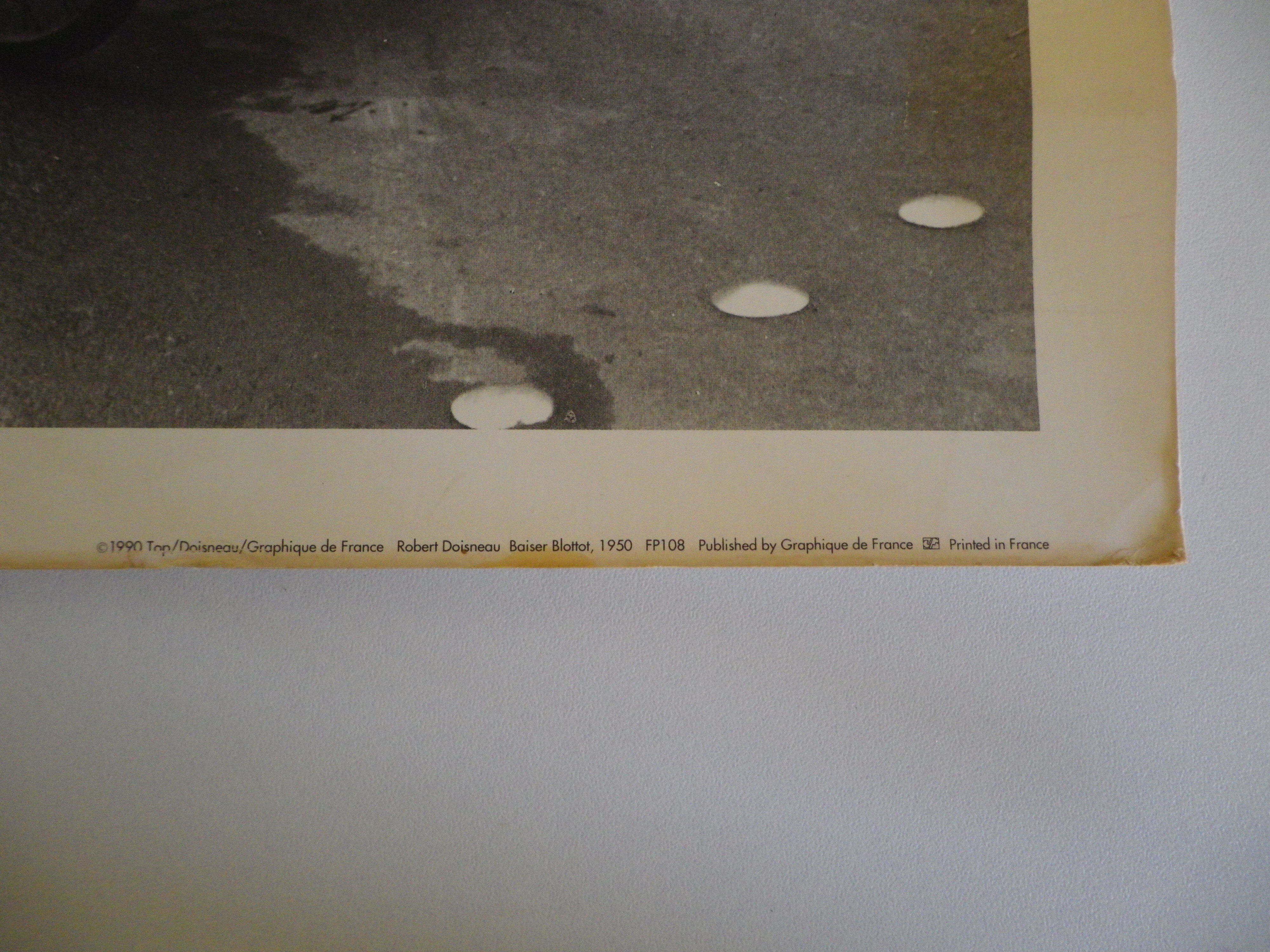 Robert Doisneau's black and white poster "Kiss Blottot" from 1950