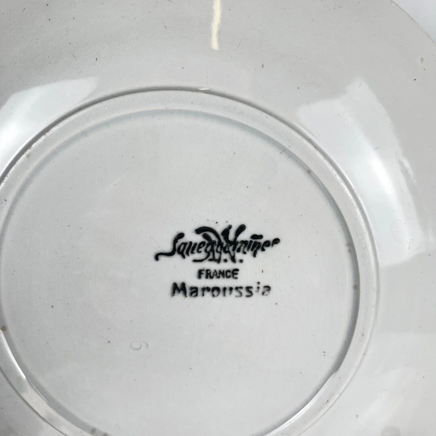 7 assiettes à dessert Sarreguemines "Maroussia", début XXe