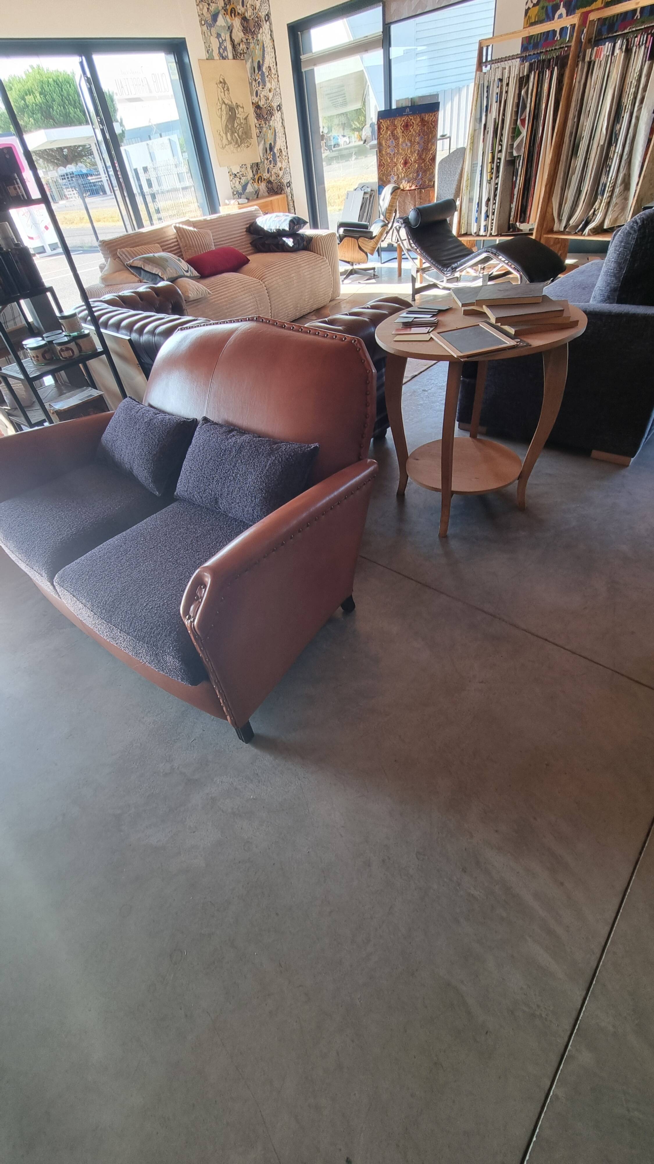 Club sofa in leather and fabric