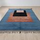 Handwoven Moroccan rug, natural wool, 250cm x 150cm, elegant decoration.