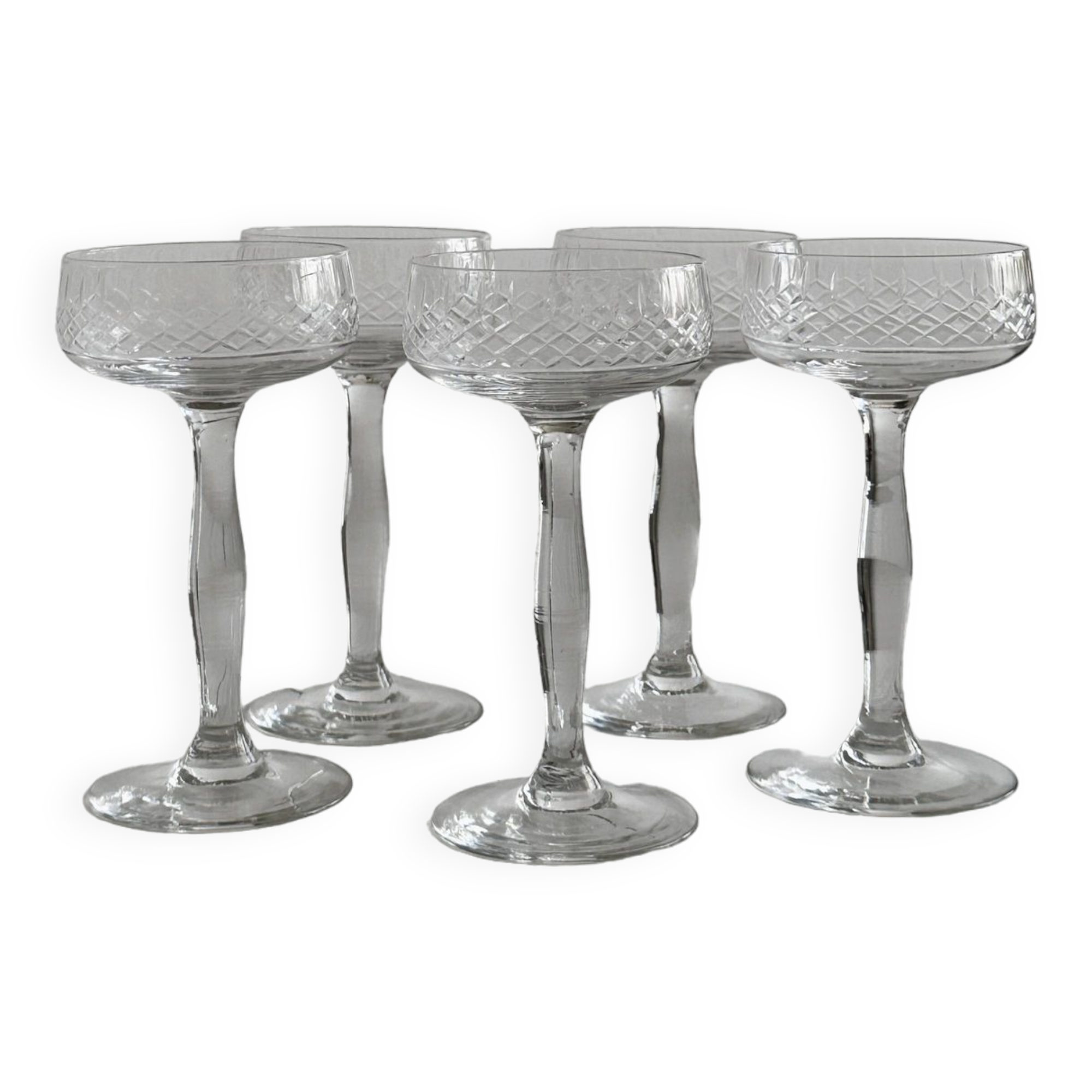 5 chiseled glass cocktail glasses.