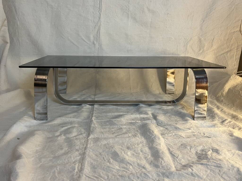 Vintage coffee table from the 70s in chrome and smoked glass, Space Age and Mid-Century style.