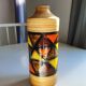 Mid-century pattern Vetrata vases and bowls by Aldo Londi for Bitossi Italy. Black, blue, orange and yellow on a brushed background.