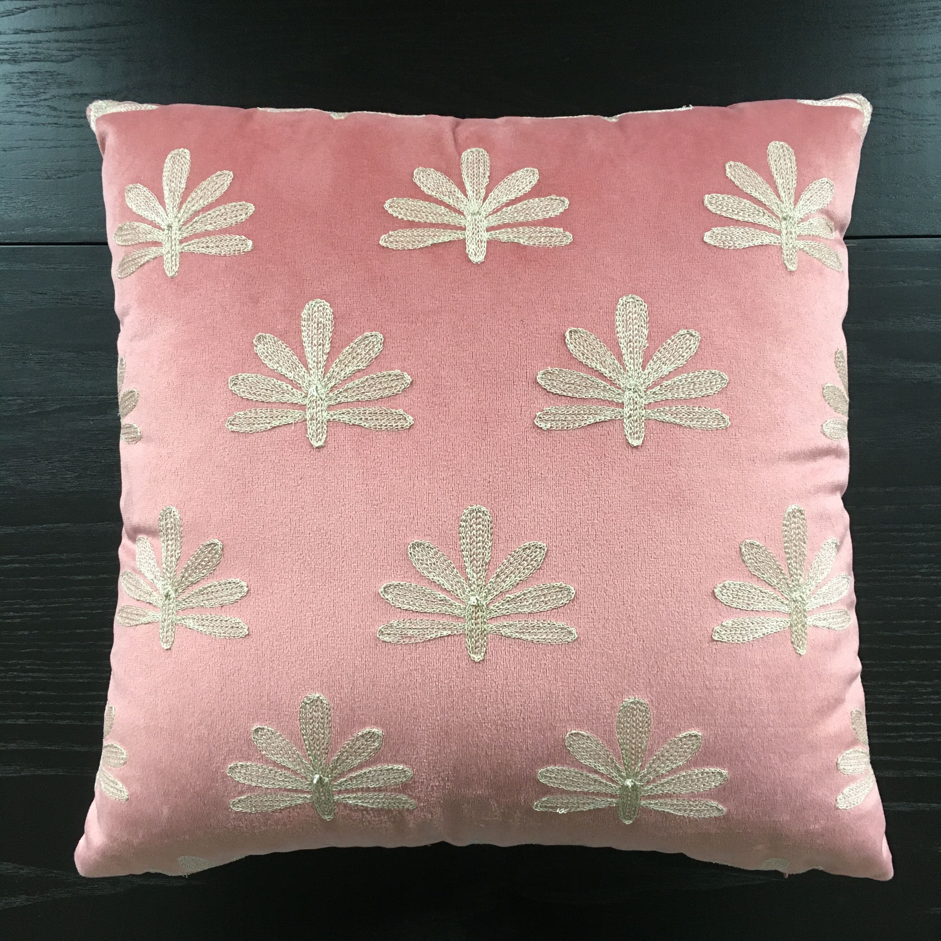 Pink cushion embroidered palm trees