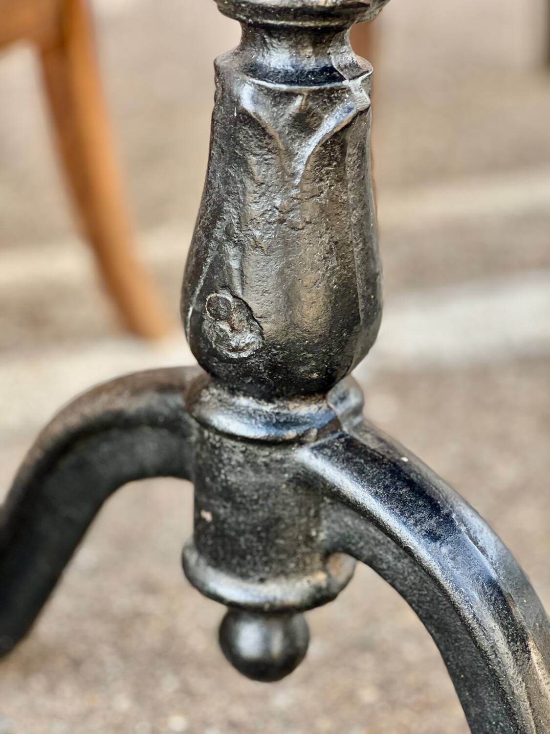 Antique bistro table with cast iron legs