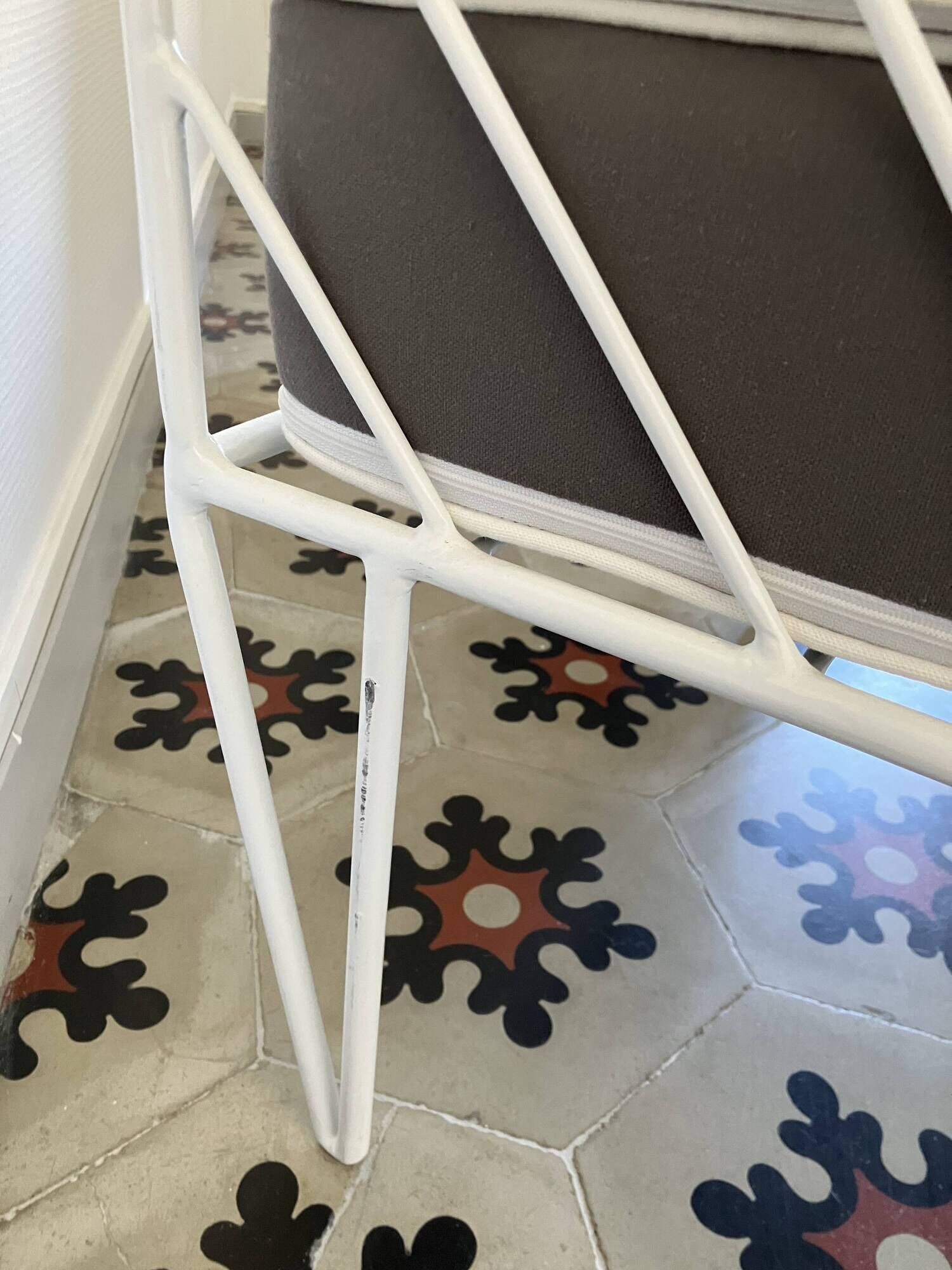 Vintage white metal Croisette style armchairs with hairpin legs in superb condition