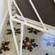 Vintage white metal Croisette style armchairs with hairpin legs in superb condition