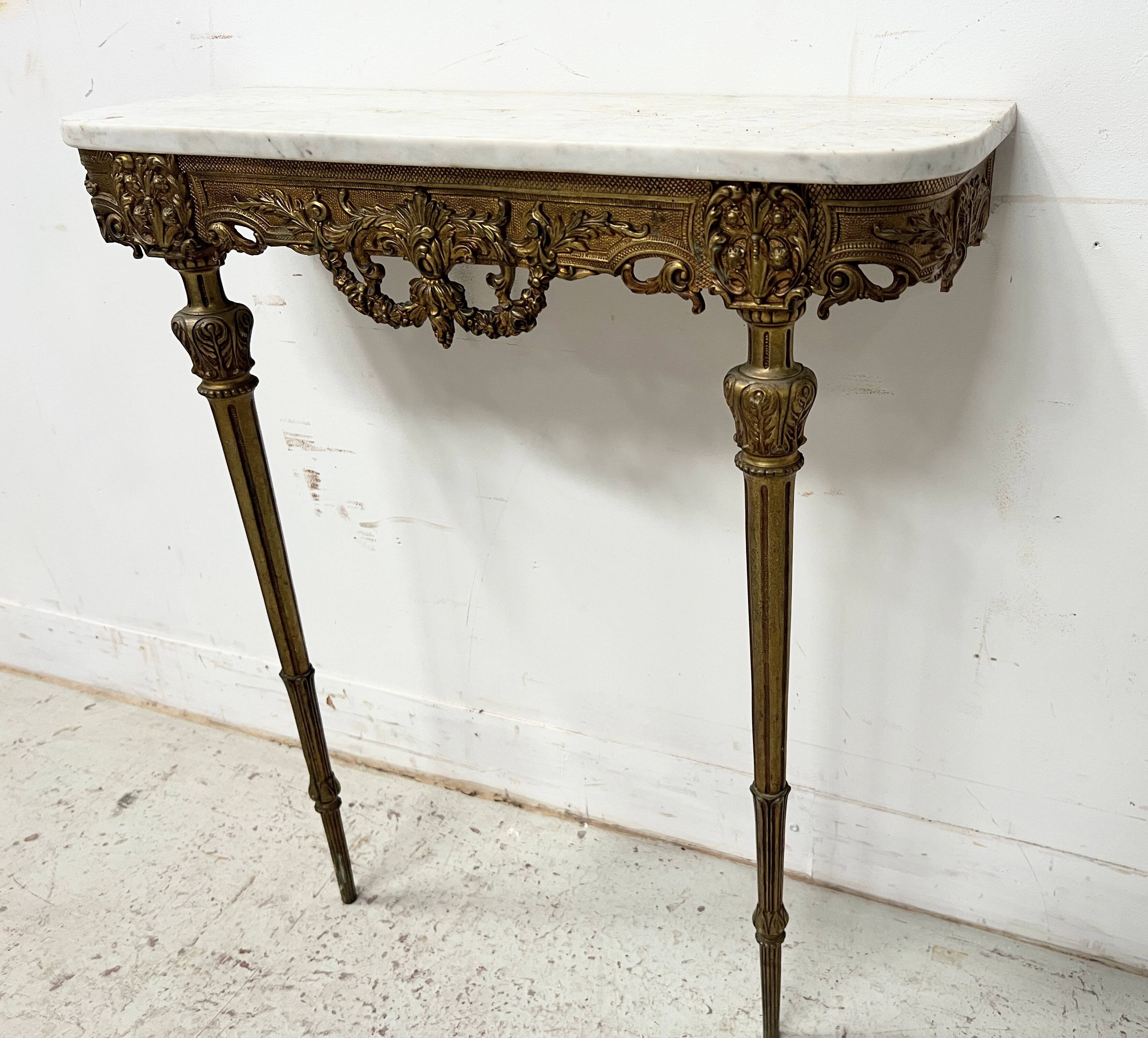 Louis XVI style console in chiselled bronze, 20th century.