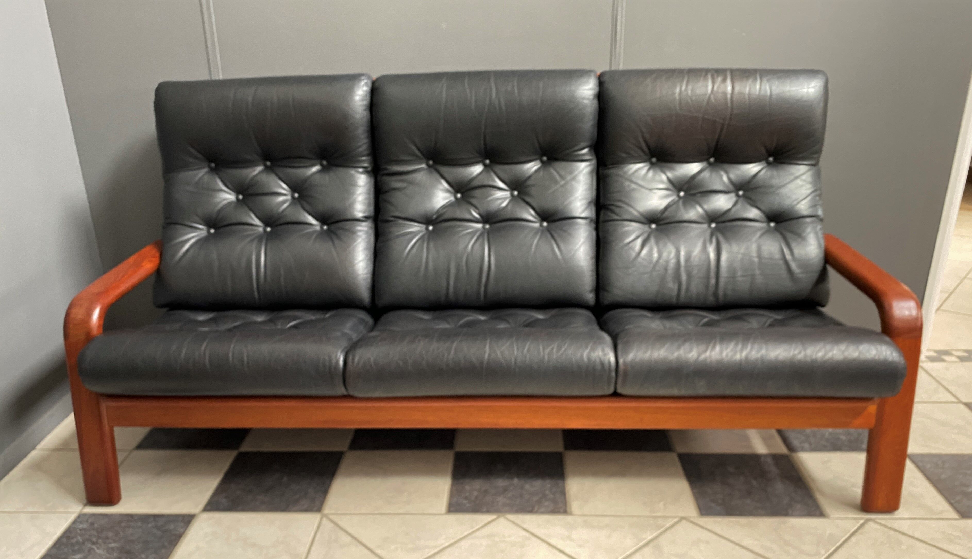 Teak and Black Leather 32 seat sofa by HS Denmark 1970s